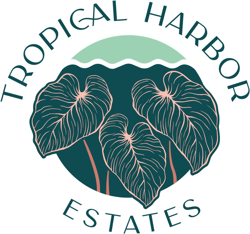 Logo for "Tropical Harbor Estates" featuring three large tropical leaves in front of a stylized sun and water background.